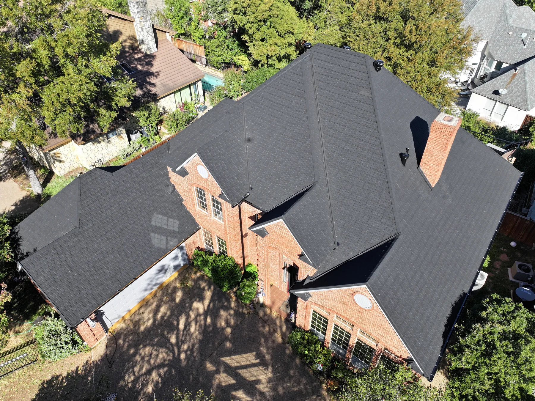 Aerial view of a complete Black Stormetal Shingle roof